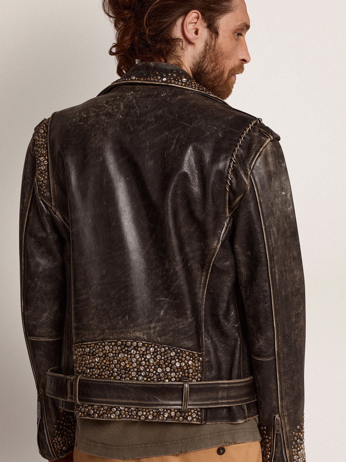 Men's leather biker jacket with hammered studs and adhesive tape | Golden Goose