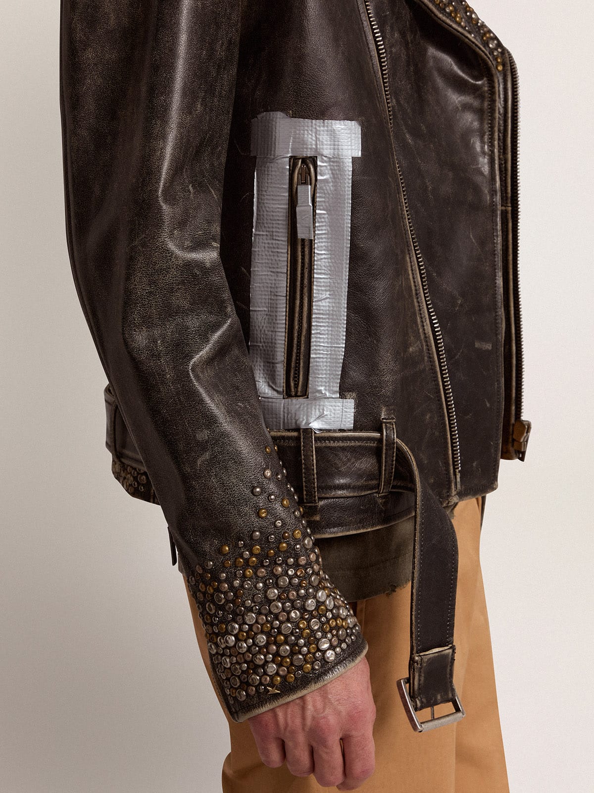 Men's leather biker jacket with hammered studs and adhesive tape | Golden Goose
