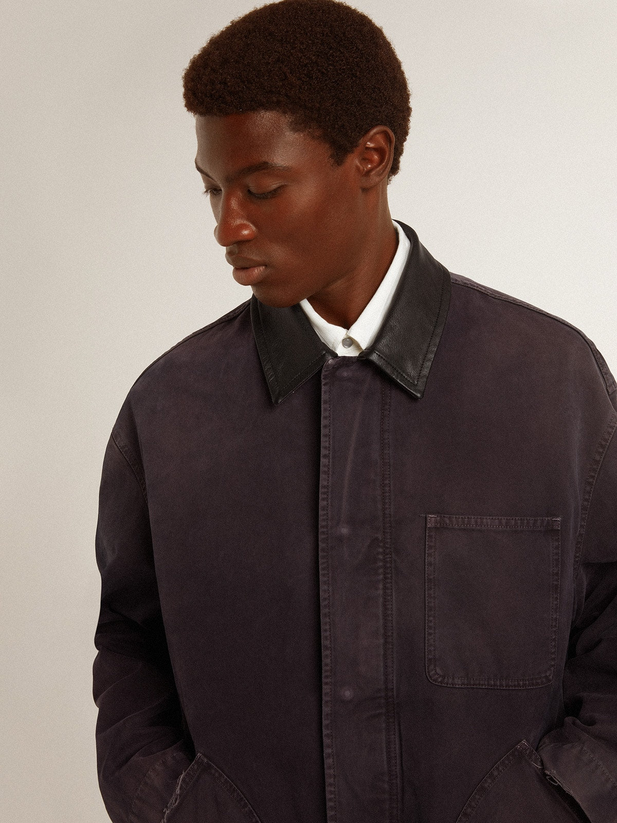 Men's denim jacket with distressed details and leather collar | Golden Goose