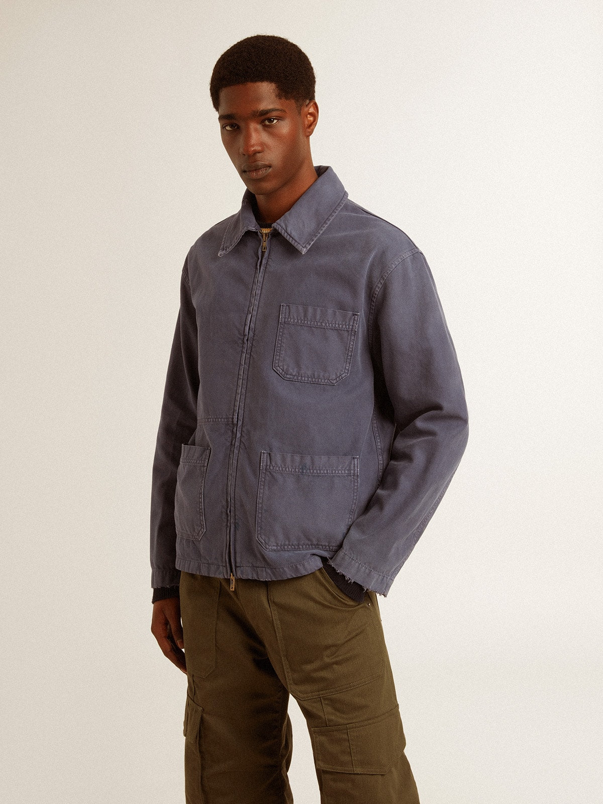 Men's blue jacket in denim cotton with distressed treatment | Golden Goose