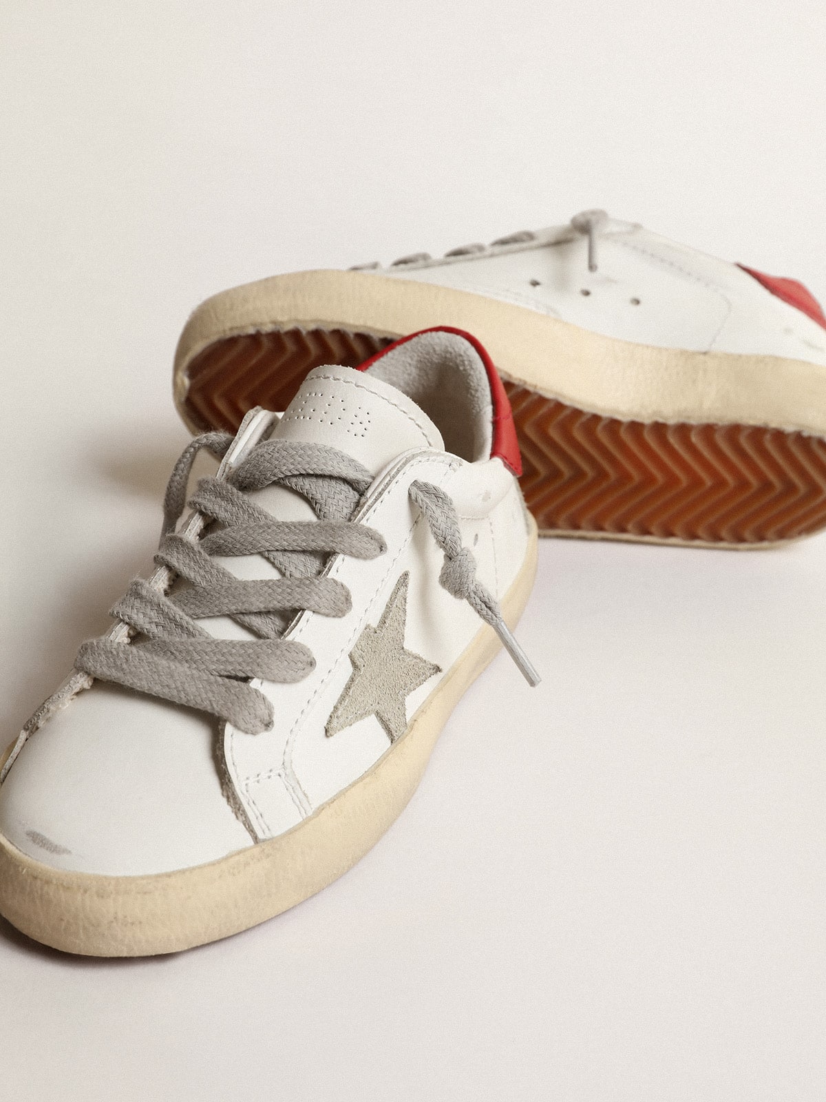 Super-Star Young with suede star and red leather heel tab | Golden Goose