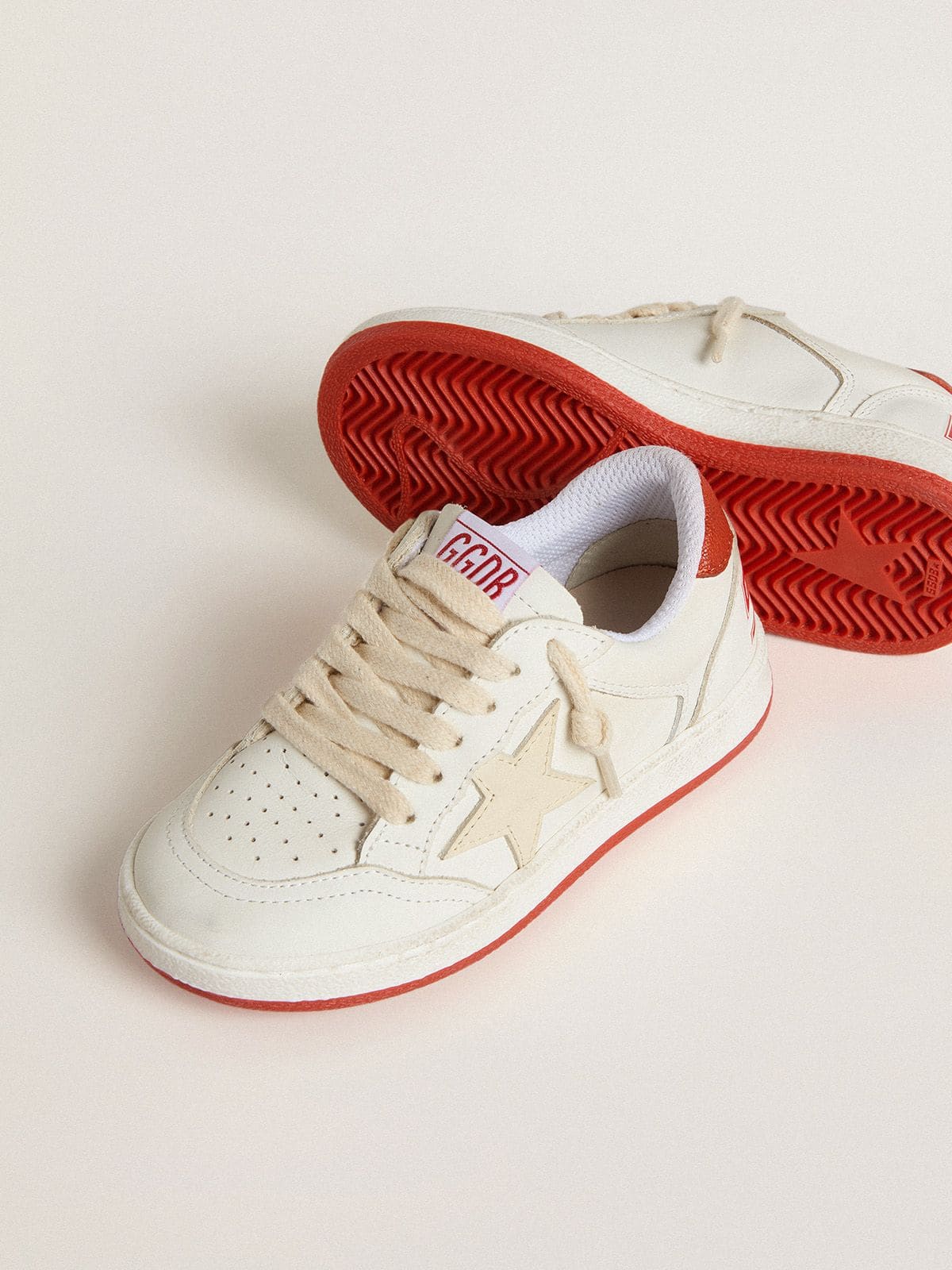 Young Ball Star in leather with cream-colored star and red leather heel tab | Golden Goose